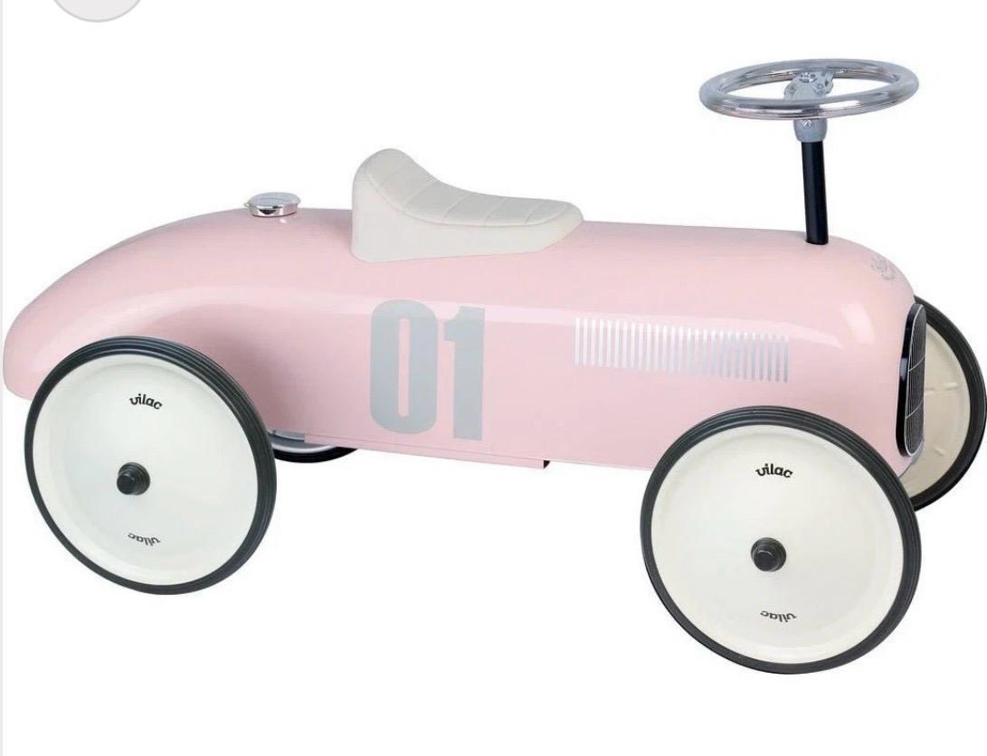 Pink vintage-style ride-on car